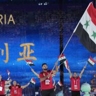 Syria's athletes and team officials arrive during the opening ceremony of the 19th Asian Games in Hangzhou, China, Saturday, Sept. 23, 2023. (AP Photo/Lee Jin-man)